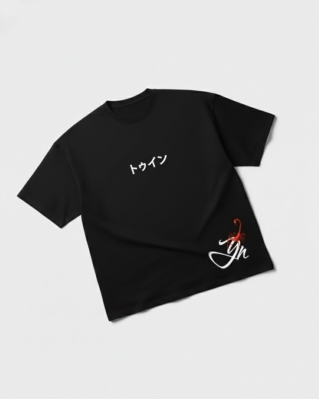 TWYN Akai Samurai black oversized t-shirt with front Japanese text and red samurai scorpion artwork, flat lay on light background
